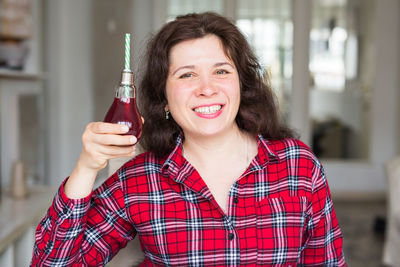 Portrait of a smiling young woman