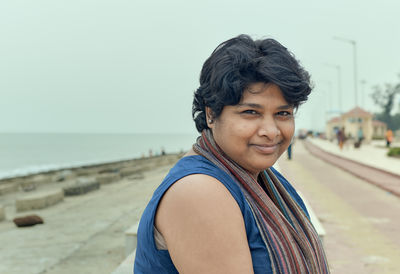 A casual looking indian tourist girl at shankarpur sea beach, in west bengal.