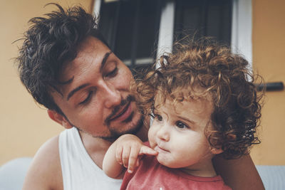 Portrait of mother and daughter outdoors