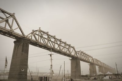 Low angle view of bridge against clear sky