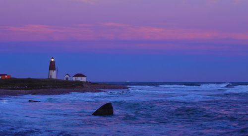 Scenic view of sea against sky at sunset