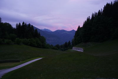 Scenic view of landscape against sky during sunset