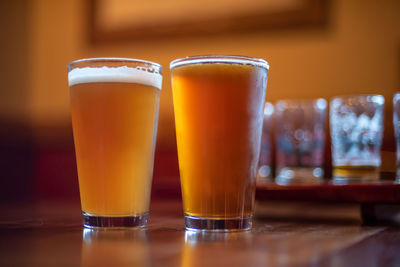 Close-up of beer glass on table