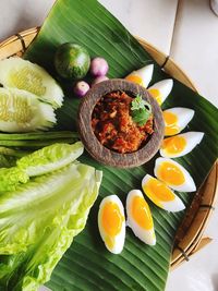 High angle view of fruits in plate on table