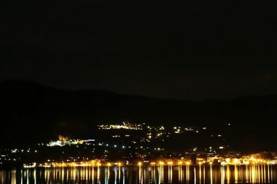 Illuminated cityscape at night