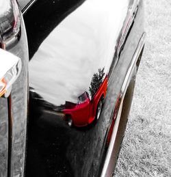 High angle view of red car on road