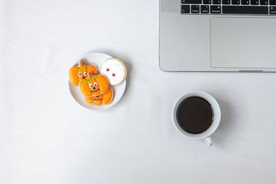 High angle view of coffee cup on table