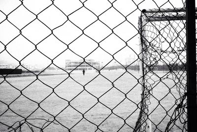 Chainlink fence against sky