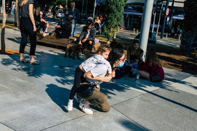 People on street in city