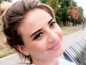 Close-up portrait of young woman