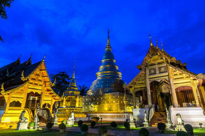 Group of people in temple against building