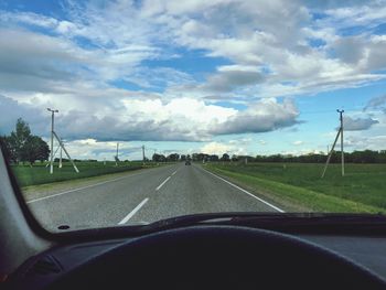 Road seen through car windshield