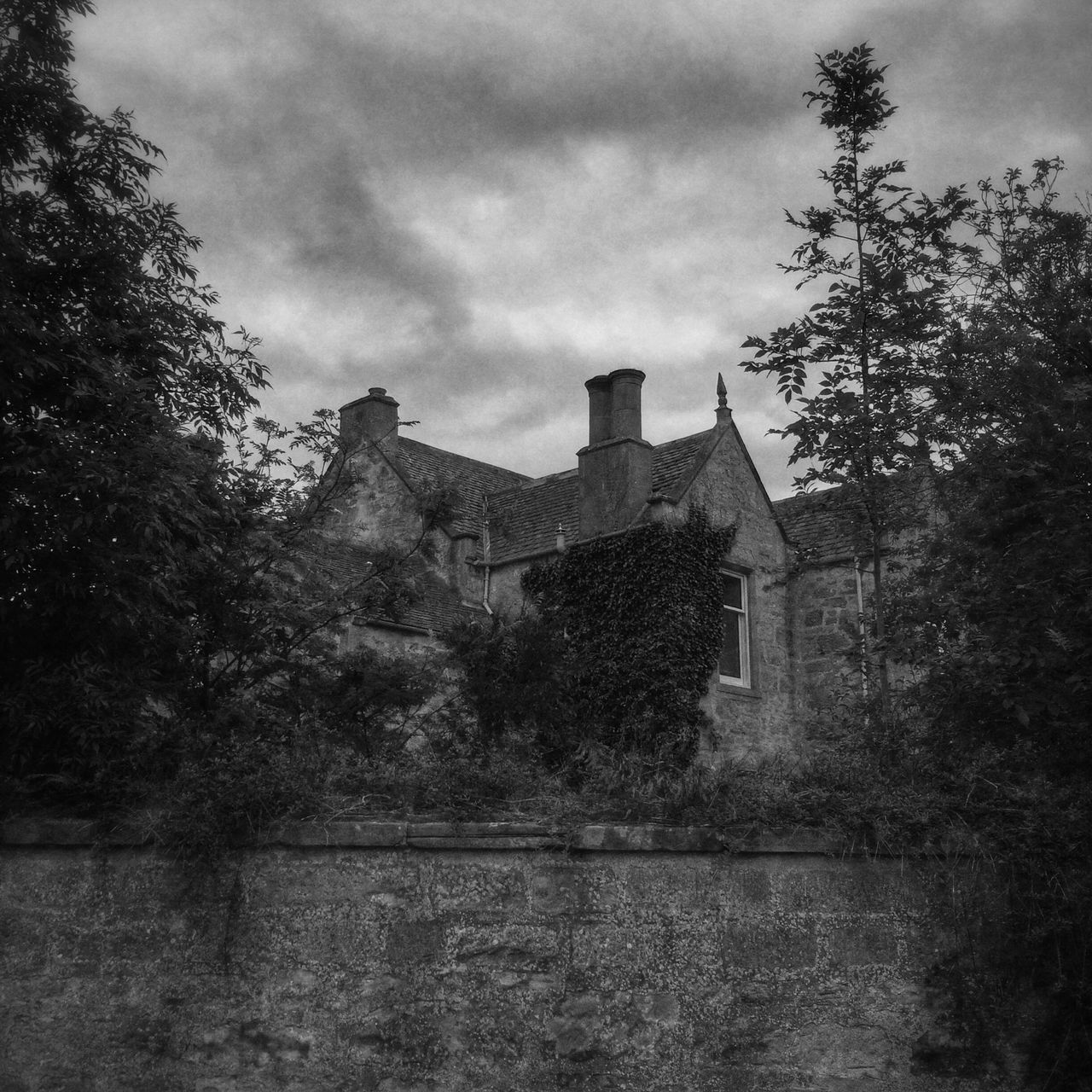 architecture, built structure, building exterior, sky, tree, cloud - sky, cloudy, house, cloud, nature, day, outdoors, weather, overcast, old, residential structure, tranquility, no people, low angle view, water