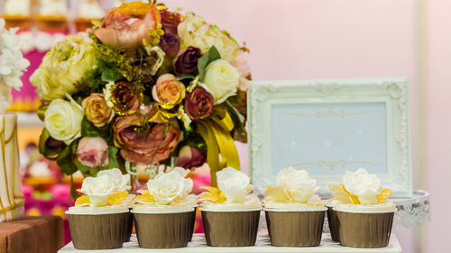 Close-up of roses on table