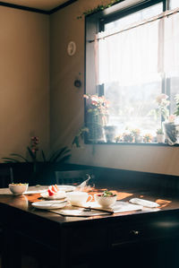 Place setting on table at home