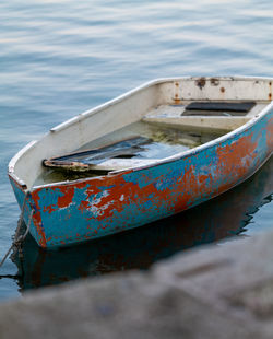 Boat moored on beach