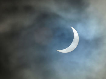 Low angle view of moon against sky
