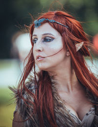 Close-up of thoughtful female model wearing tiara