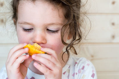 Close-up of girl eating ice cream