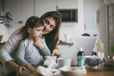 Mother and daughter at home