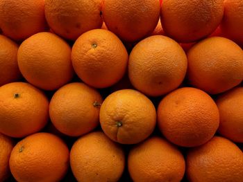 Full frame shot of oranges in market