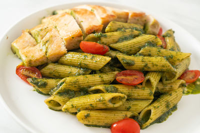 High angle view of pasta in plate on table