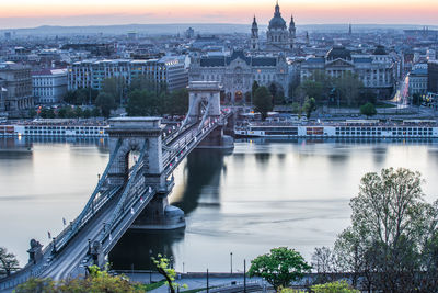 High angle view of bridge over river at sunset