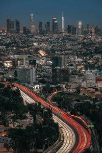 High angle view of illuminated downtown los angeles during sunset