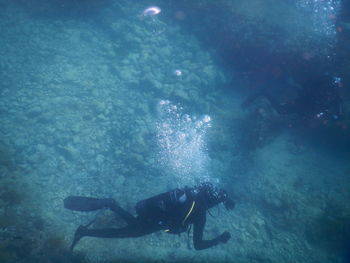 Man swimming in sea