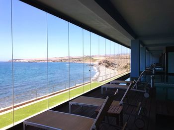 Scenic view of sea seen through window