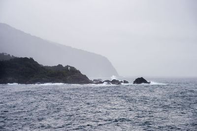 Scenic view of sea against clear sky