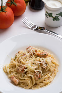 High angle view of carbonara in plate on table