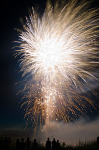 Low angle view of firework display