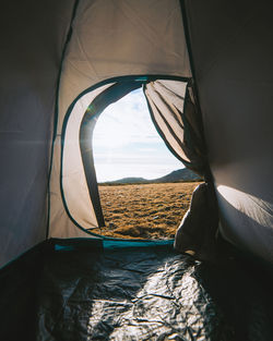 Scenic view of landscape seen through window