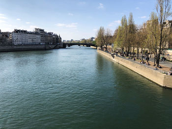 View of bridge over river in city