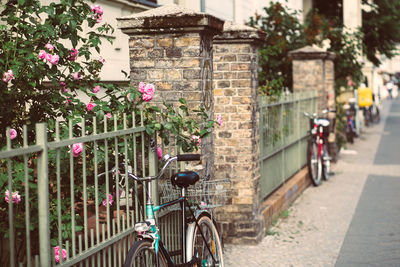 Bicycles on railing in city