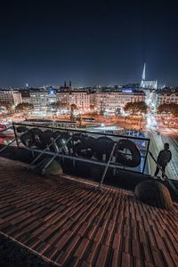 View of illuminated buildings in city at night