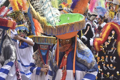 People wearing mask in traditional festival