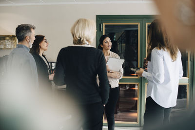 Businessman colleagues communicating at conference