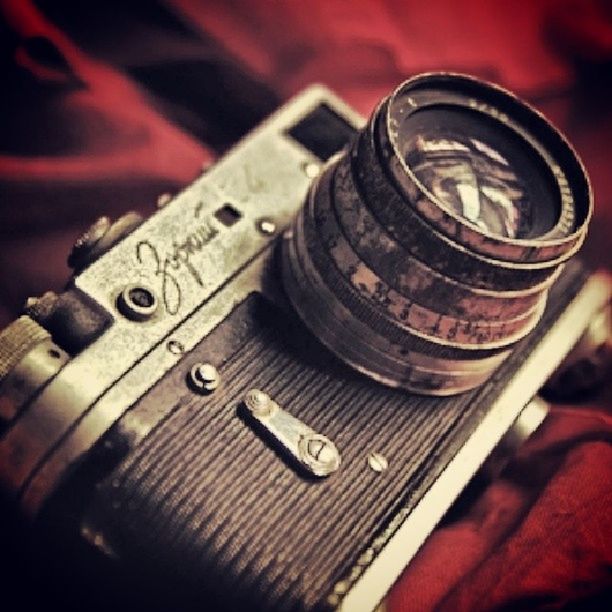 close-up, indoors, still life, selective focus, wood - material, focus on foreground, old, table, metal, old-fashioned, single object, high angle view, music, rusty, no people, equipment, technology, work tool, part of, wooden