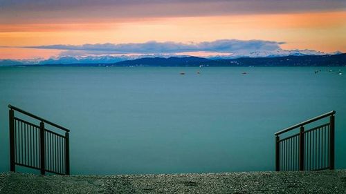 Scenic view of mountains against cloudy sky