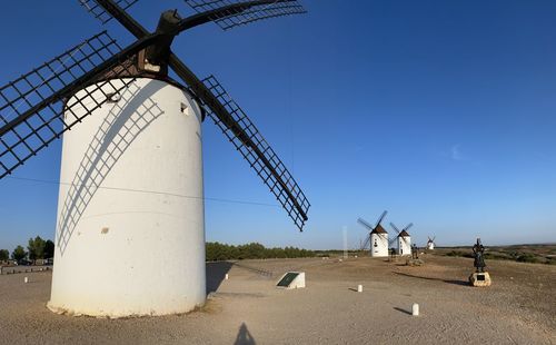 Traditional windmill against sky