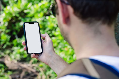Close-up of woman using mobile phone