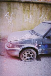 Abandoned car on street