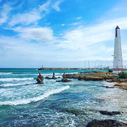 Scenic view of sea against blue sky