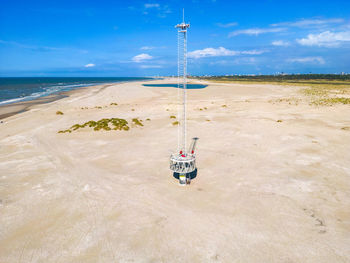 Aerial photo of the sand motor beach with the argus mast near the kijkduin beach of the hague