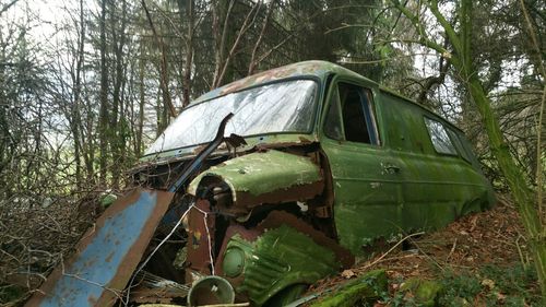 Abandoned car on road