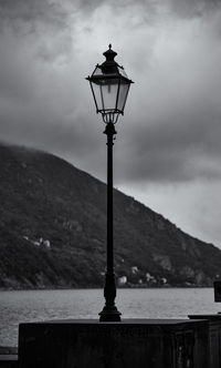 Street light against sky