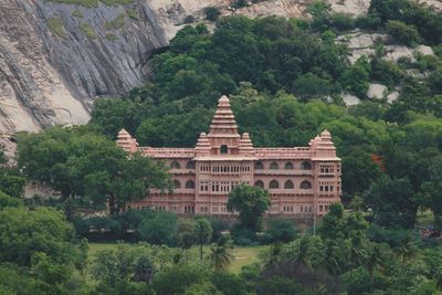 View of temple against building