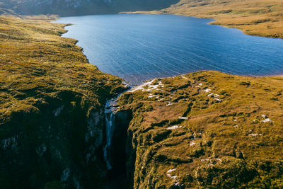 Wailing widow falls in assynt, north west highlands of scotland. falls with smoothed water, stream